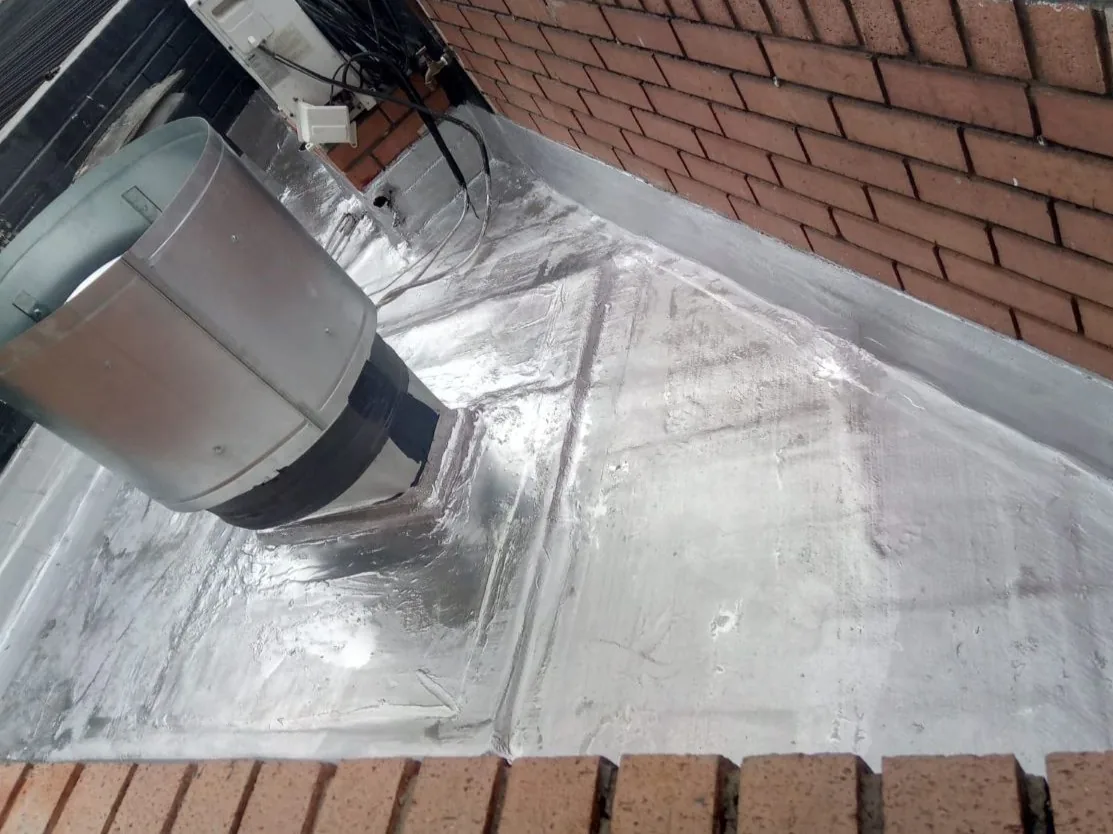 Emergency roof waterproofing repair completed by Drytek around a roof vent and flashing detail in Johannesburg
